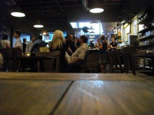 A view of 15th Ave. Coffee with a store full of people