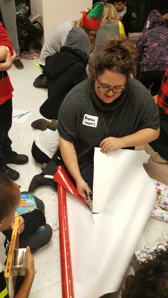 1 - 1 - 20161219_132611 fabiola helping with wrapping presents