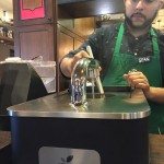 IMG_00441 Sean making a Clover - 2017 Jan 01 - East Olive Way Starbucks