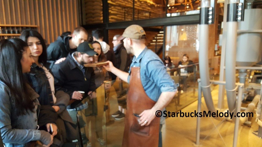 2 -1 - 20170312_140634 Mikey showing a tray of Rwanda Musasa to guests